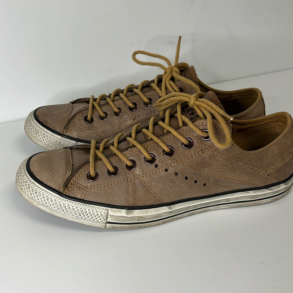 Converse All Star leather sneakers low top with zipper detail.